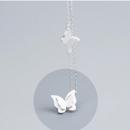 Ensemble de bijoux avec un motif de papillon