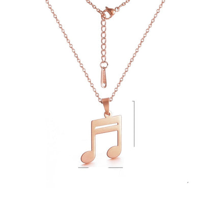 Collier avec pendentif en forme de note