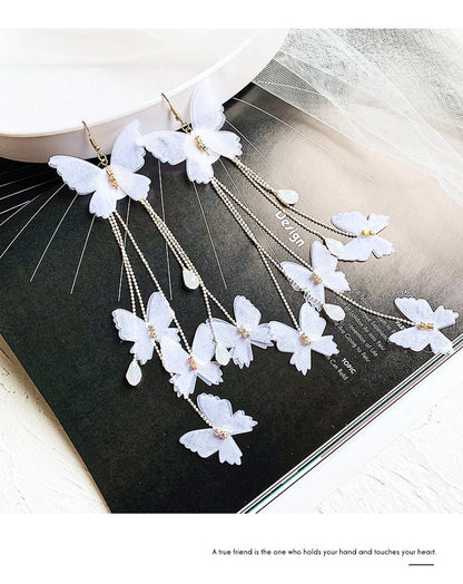 Boucles d'oreilles longues - papillons