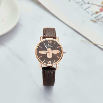 Montre pour dames avec motif d'abeille.