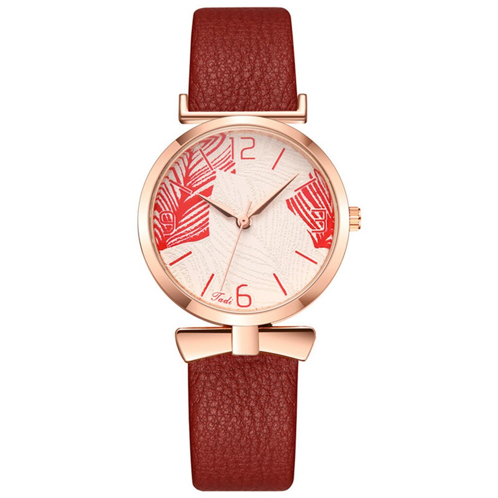Montre pour dames minimaliste avec motif de feuille