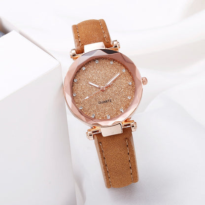 Montre pour dames avec un cadran scintillant sur un bracelet
