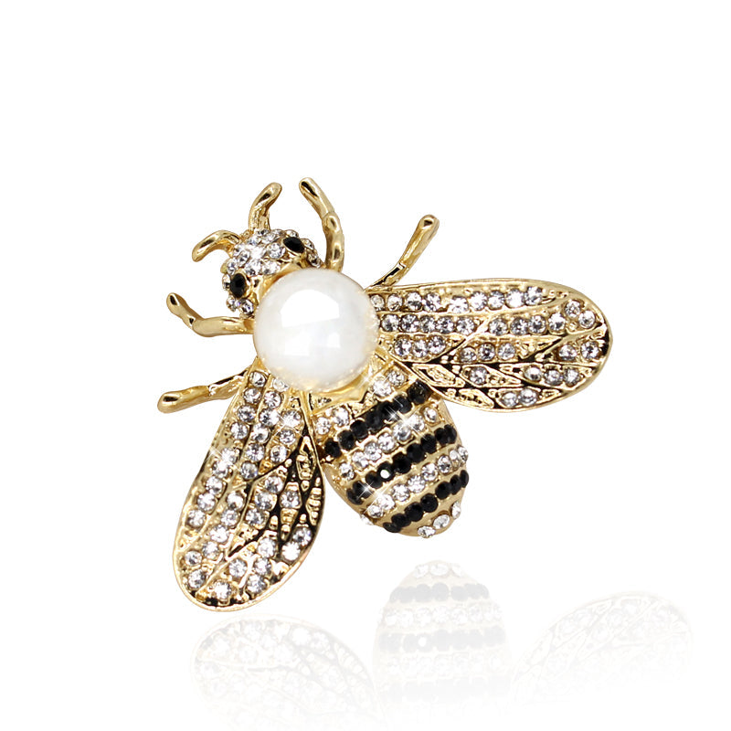 Broche avec une imitation de perle - abeille