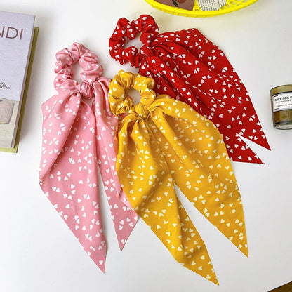Élastique à cheveux avec nœud