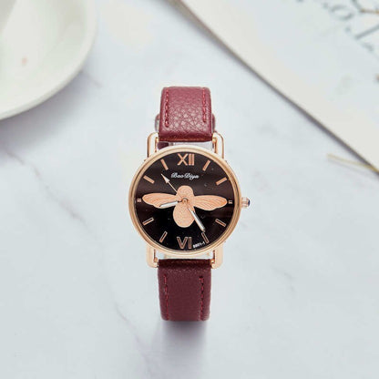 Montre pour dames avec motif d'abeille.
